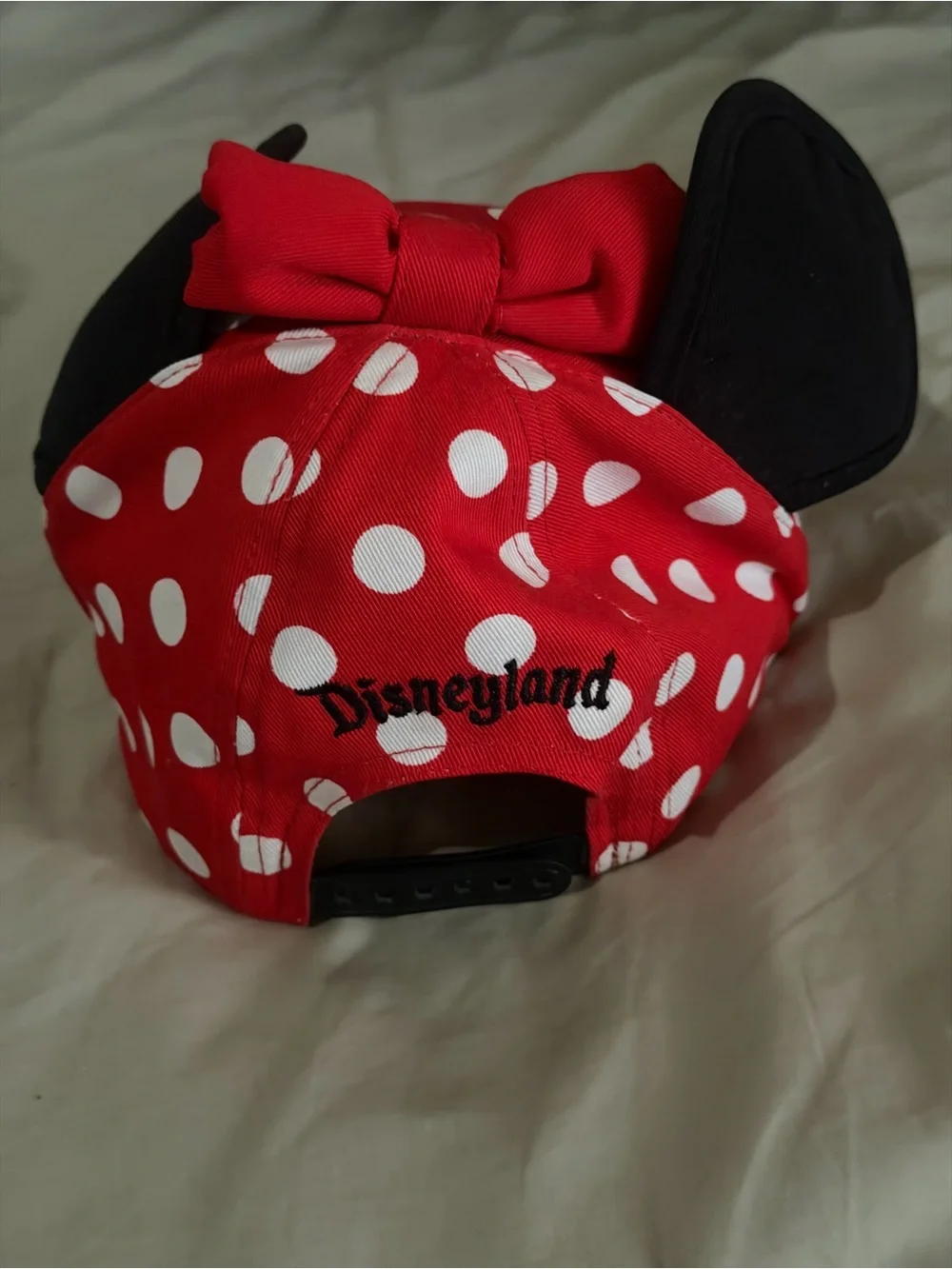 Disney unisex Red Polka Dot Minnie Mouse Ear Hat with Black Ears and bow